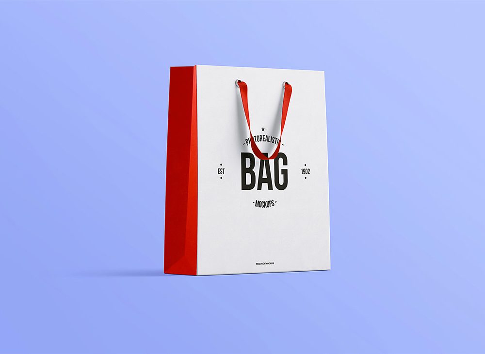 Free shopping bag on blue background mockup