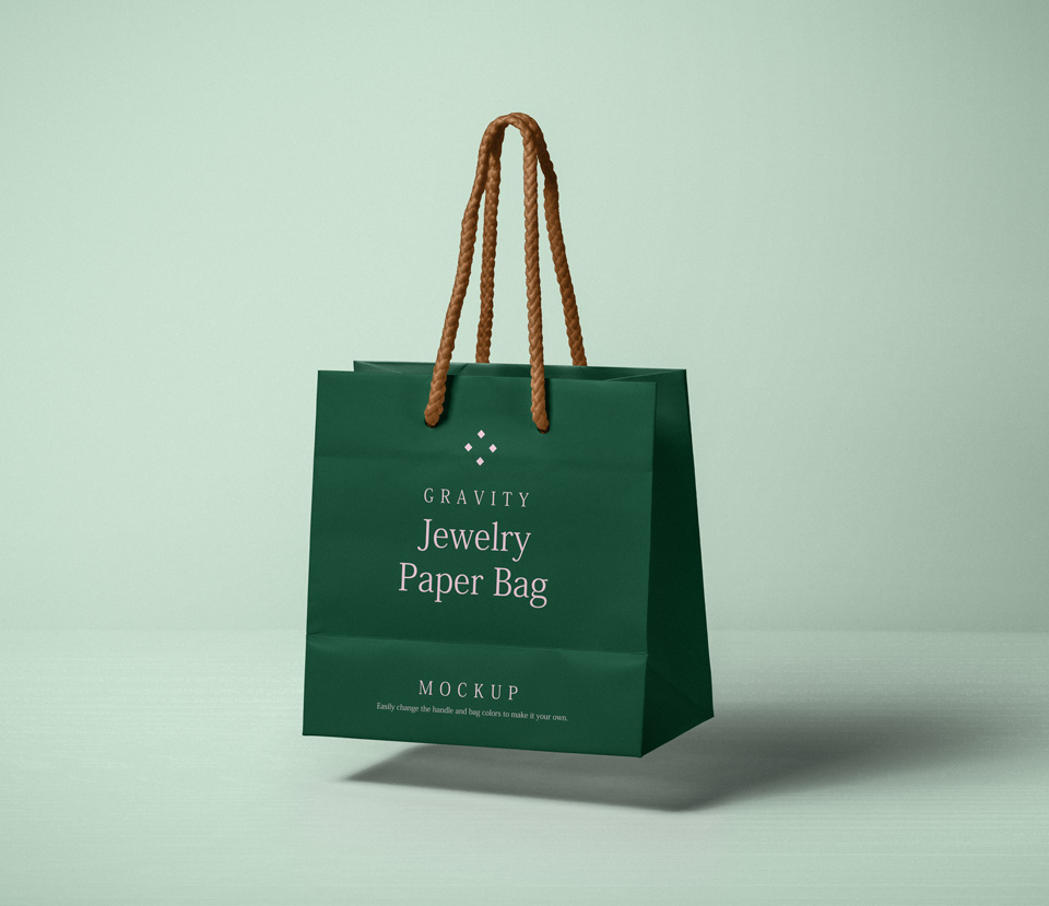 Free green paper shopping bag mockup