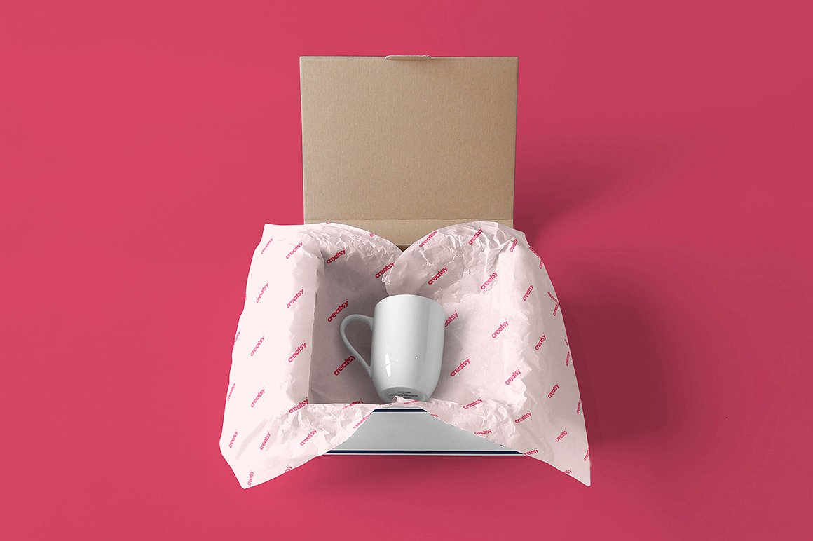 A mailing box with wrapping paper mockup