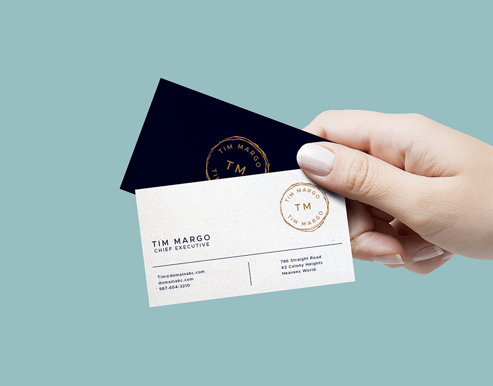 Free hand holding business cards mockup
