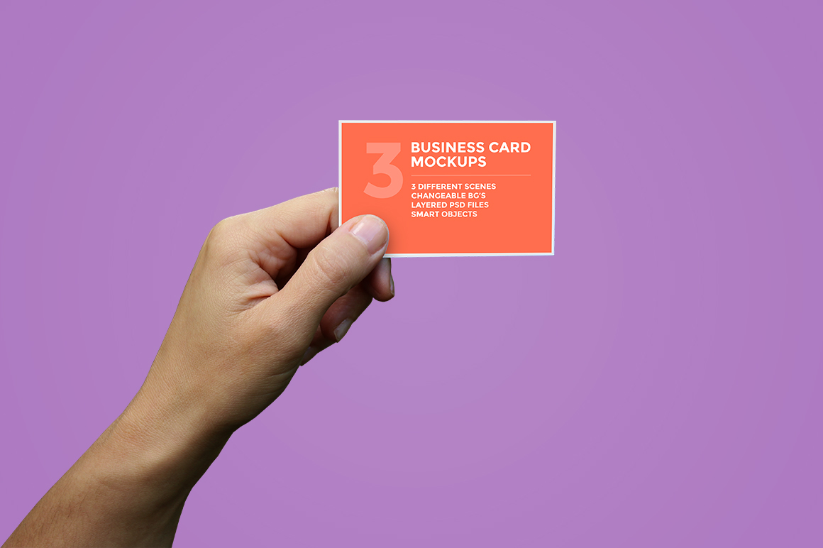 Hand holding business card mockup template