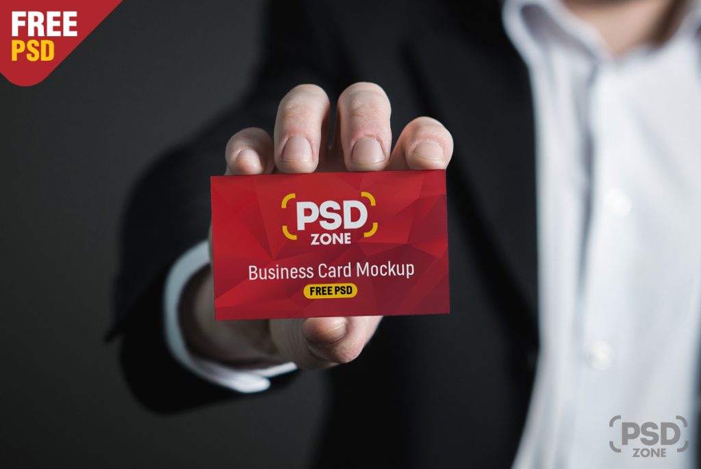 Business card in hand mockup free