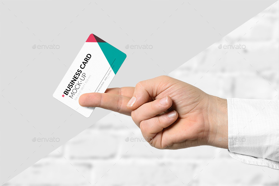 Hand holding business card mockup template