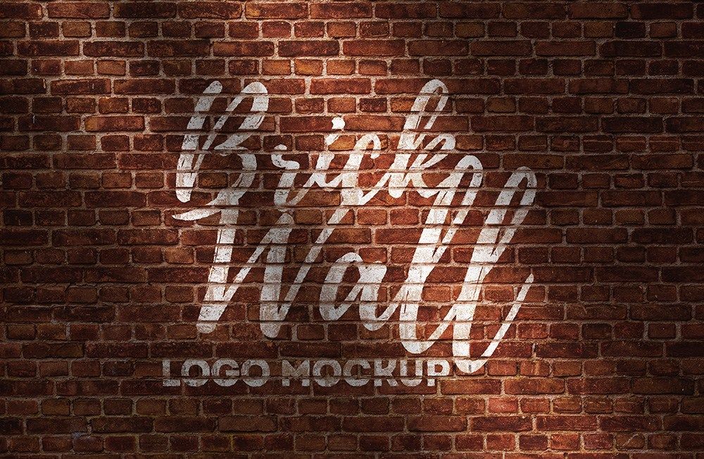 Free logo mockup on brick wall