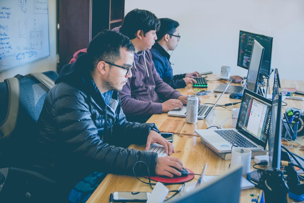 An it specialists working and learning