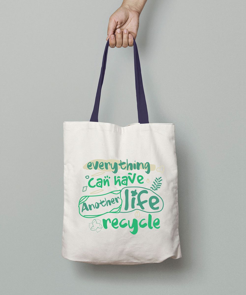 An ecology tote bag with a text