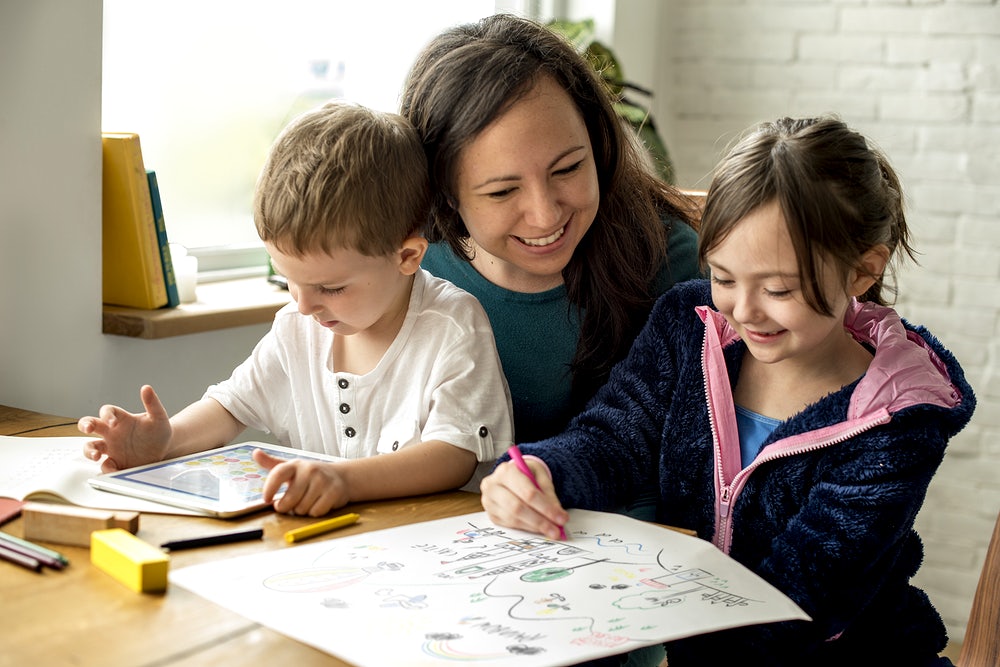 Teacher with a childrens drawing