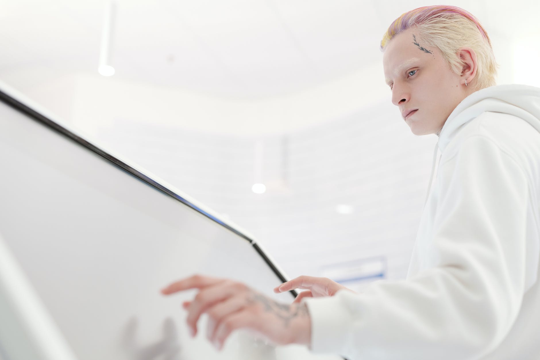 A futuristic man working with a screen