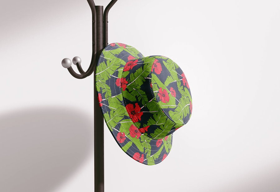 Green bucket hat on hanger mockup