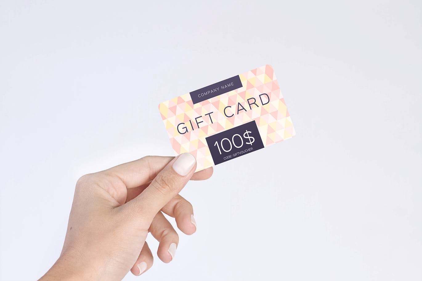 A gift card in hand mockup