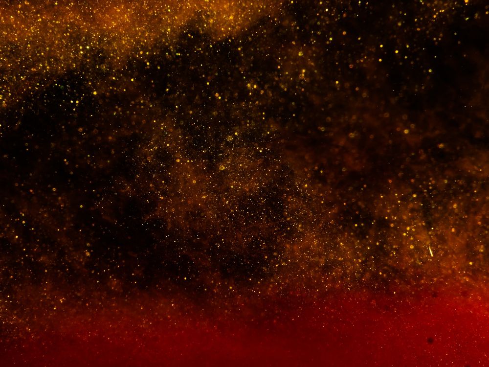 Free gold and black particle background