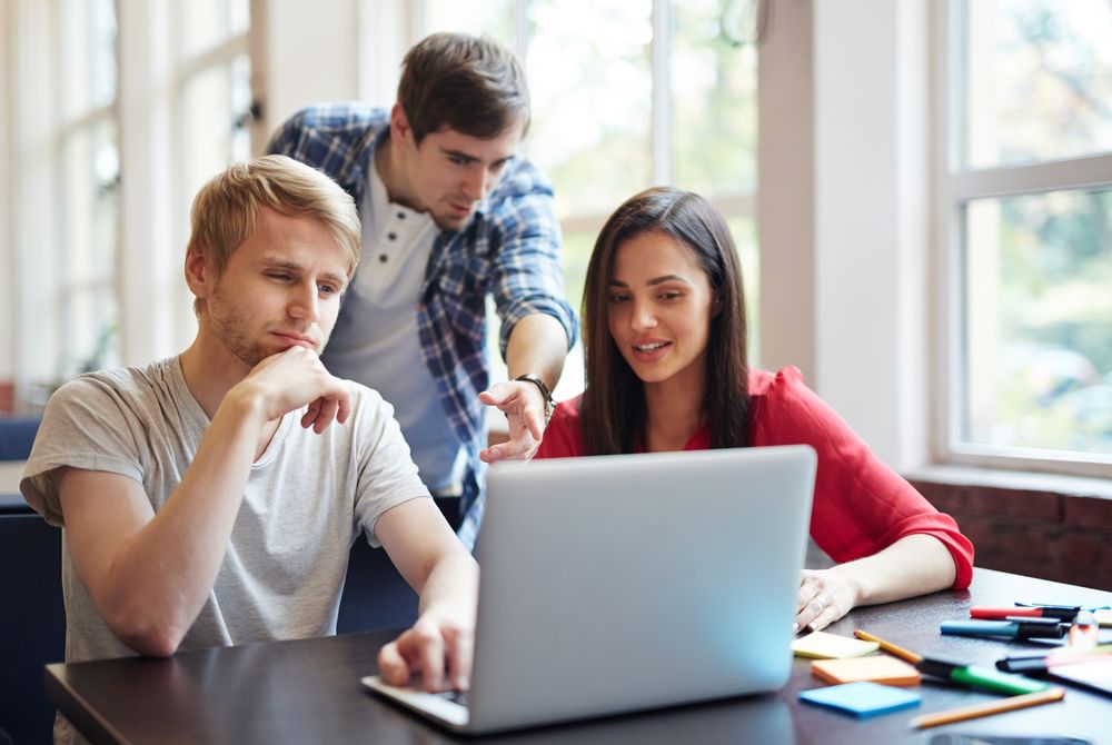 People watch a marketing video by computer