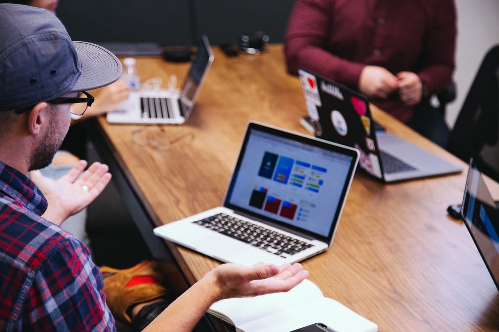 A company meeting with computers