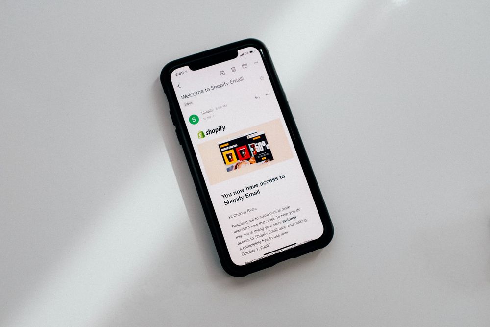 iPhone with shopify website layout