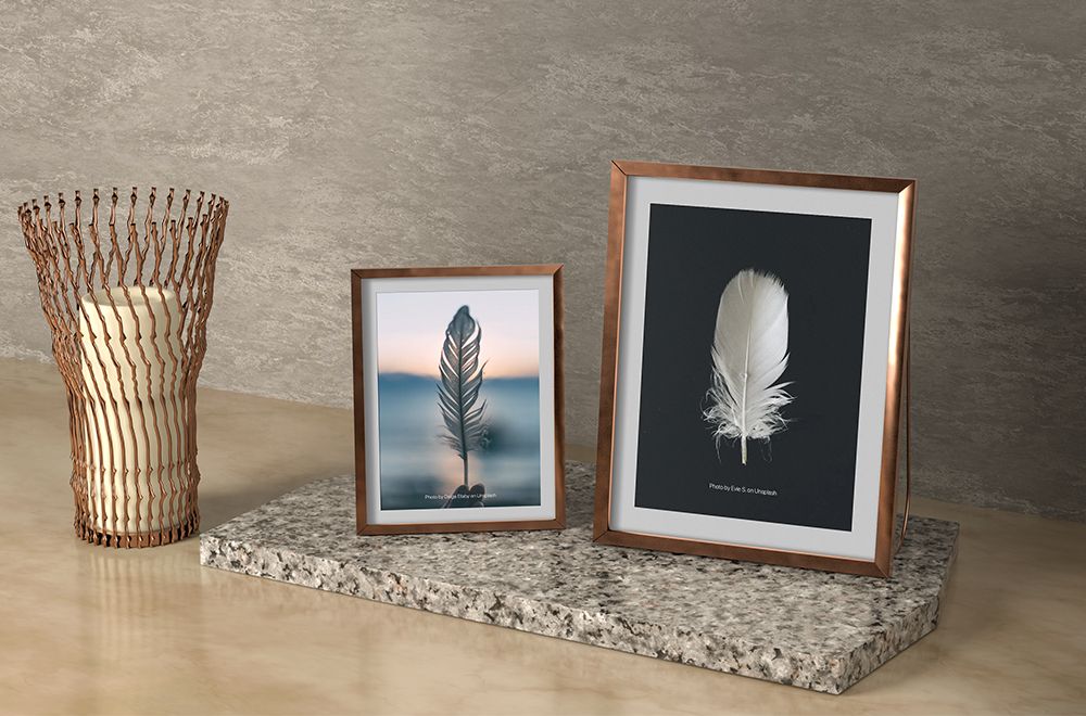 Free photo frames on desk mockup