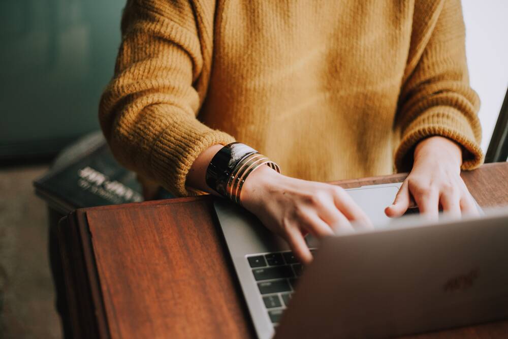 Woman typing the keyboard