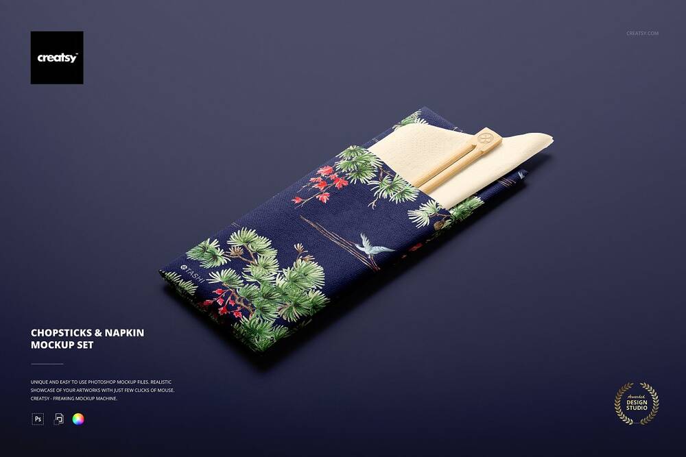 Chopsticks and napkin on dark background