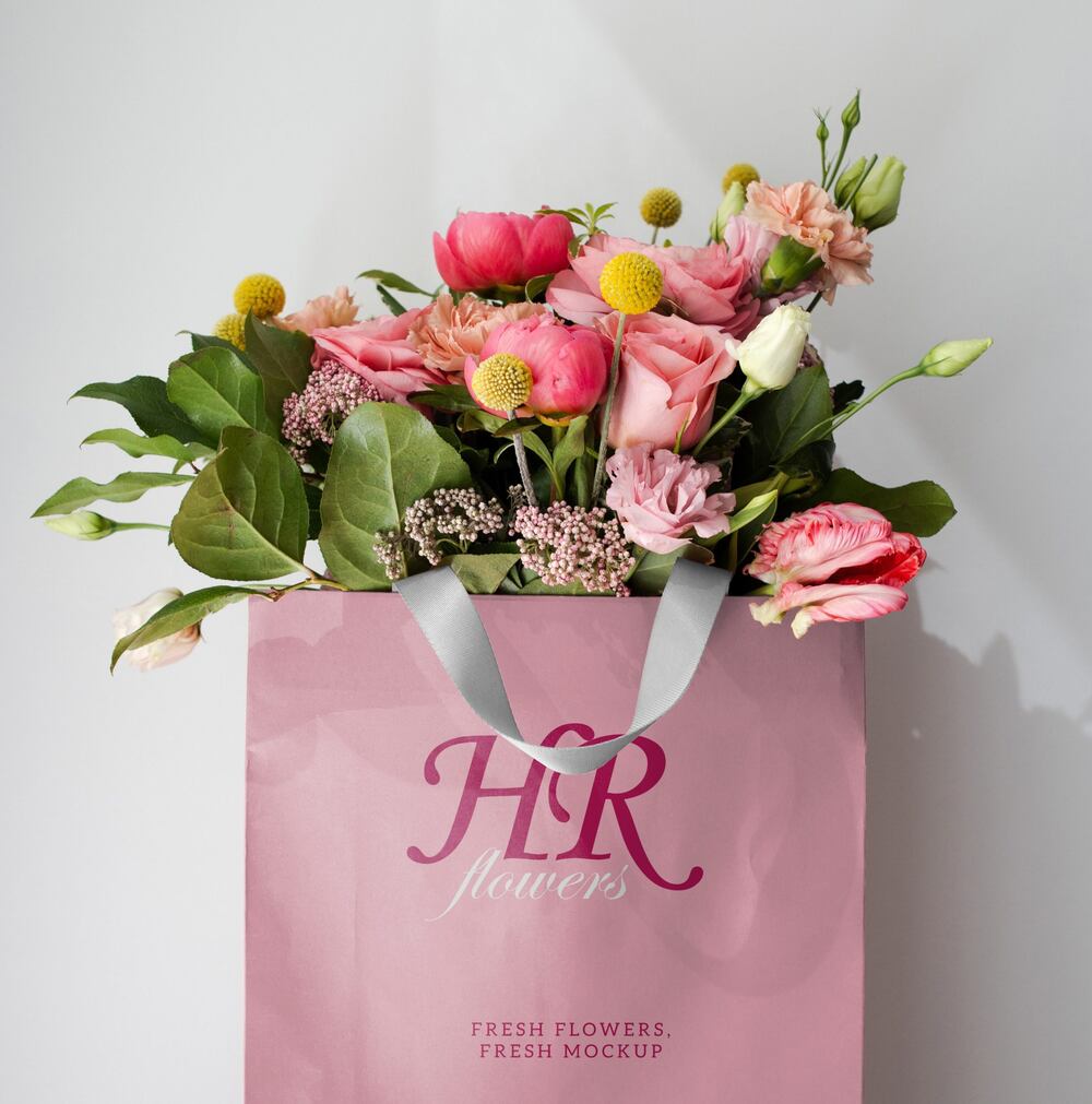 A handbag mockup full of flowers