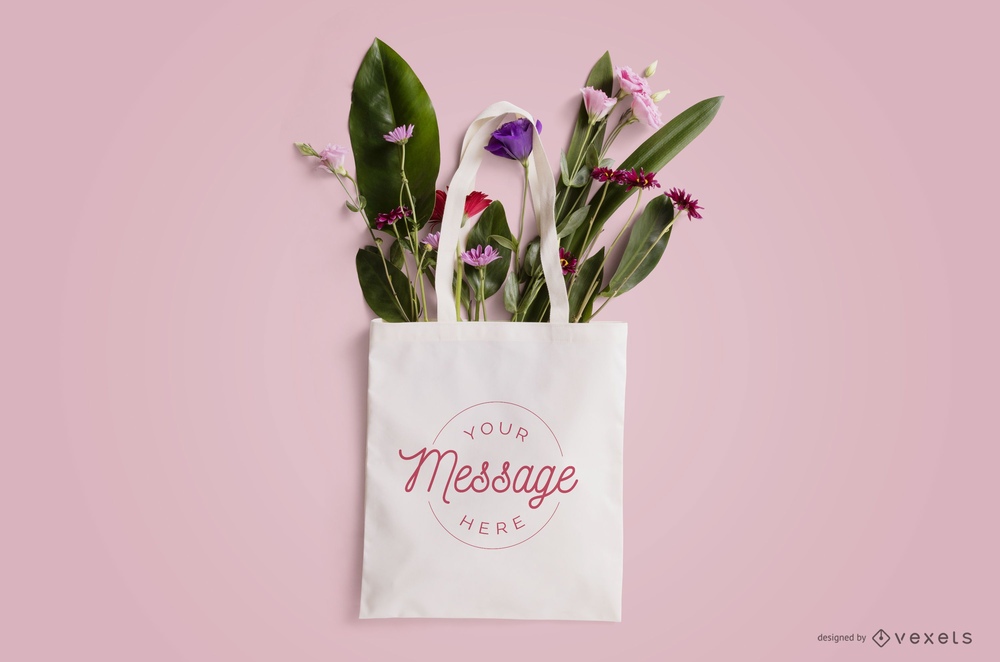 A tote bag mockup with flowers